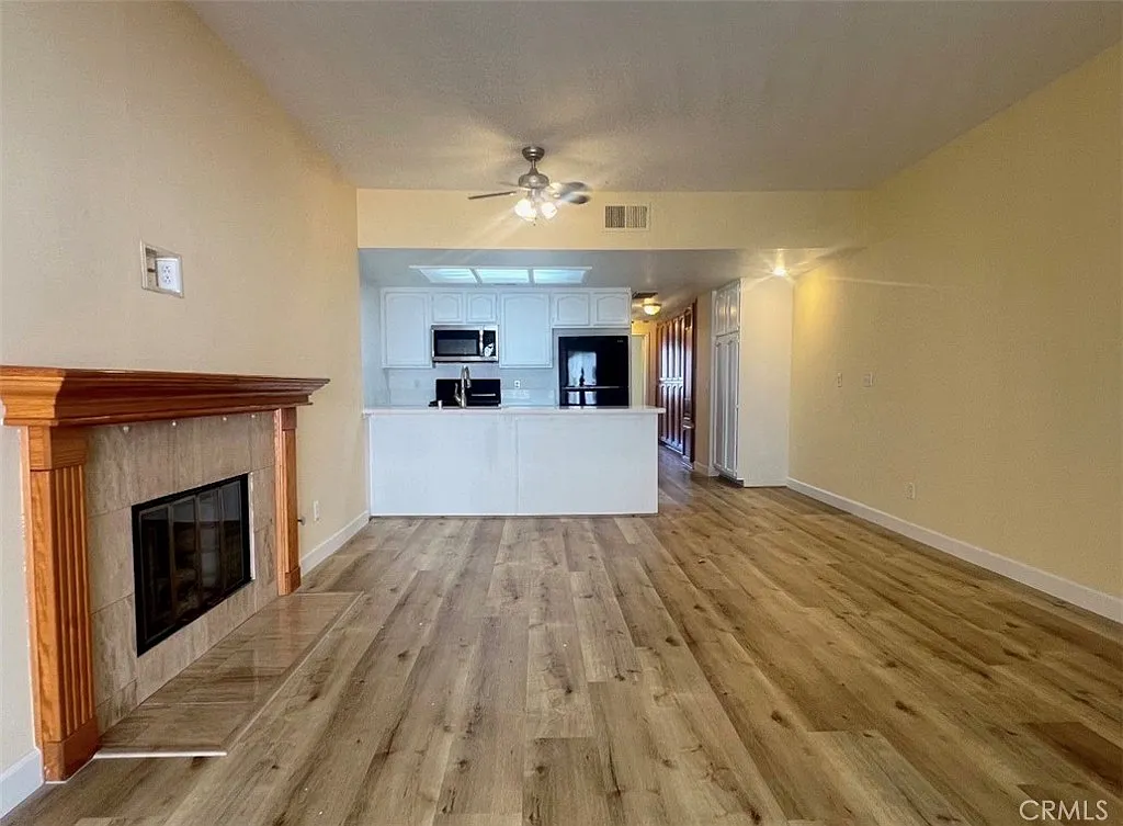 Building Photo - 11620 Warner Ave #526