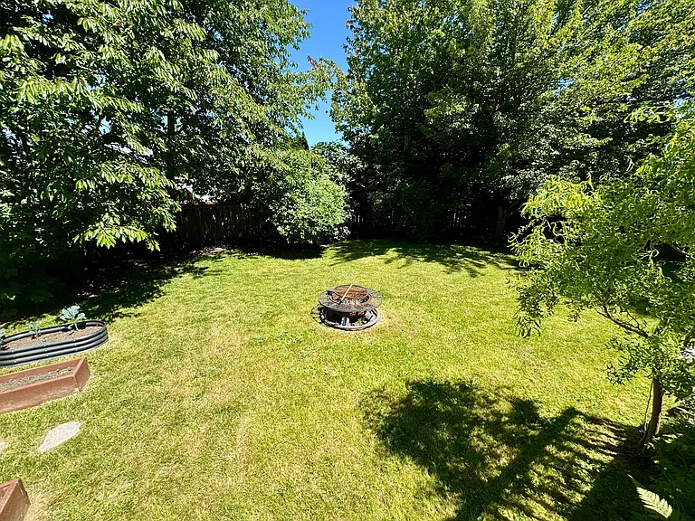 Large Fully Fenced Backyard & Firepit
