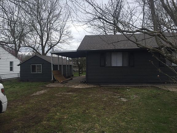 Front Exterior/Carport/Shed