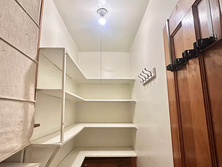 large pantry attached to kitchen