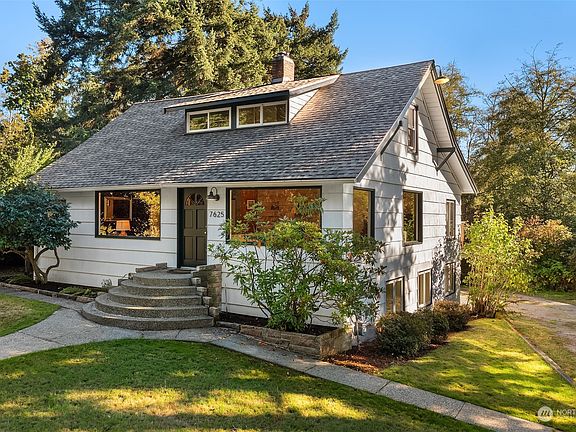 The home includes three levels -- much larger than it looks from the street.>
