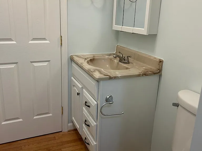 half bath there are 4 full baths as well