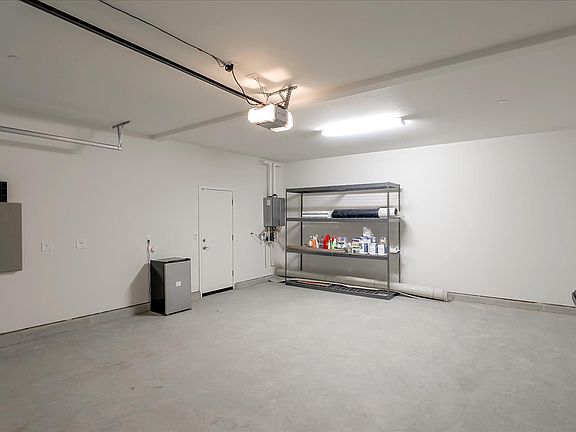 Garage. Comes with shelves and mini fridge.