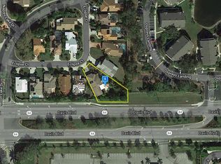 5038 Eclipse Ct, Naples, FL 34104