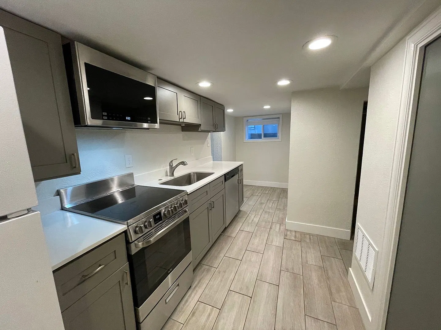 Renovated 2-Bed Retreat in Prime Englewood | Steps from City Center, Light Rail & Hospitals — Photo 3