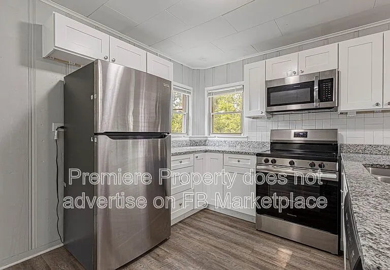 1107 W 27th St S — Photo 6