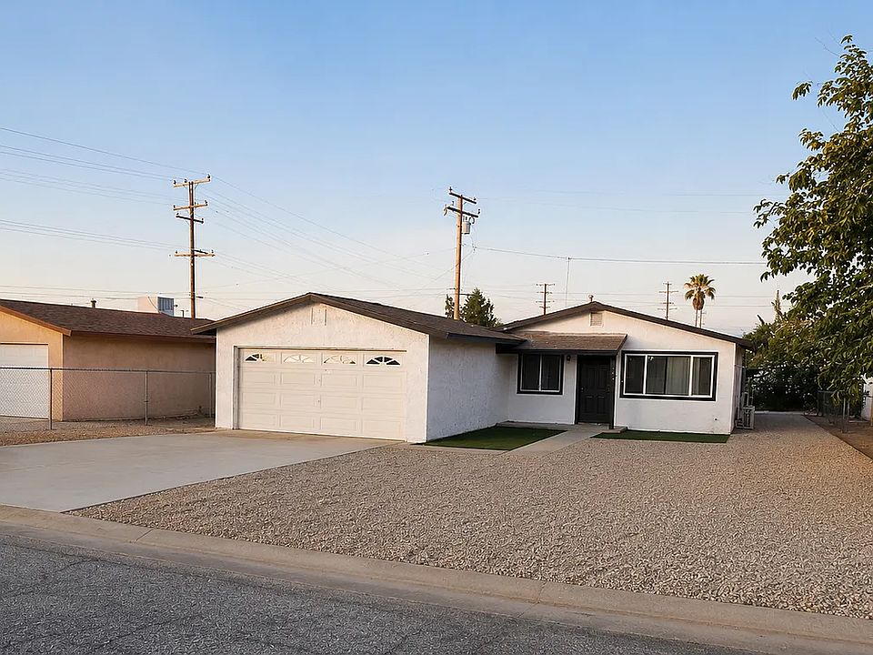 NEW OUTSIDE REMODEL, EASY UNKEEP, FENCED YARD