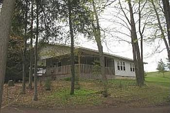 A view of the front looking down into the woodlands