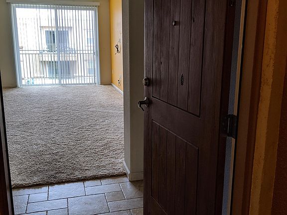 Travertine flooring in the entryway