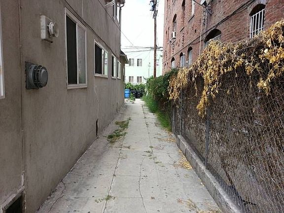 Driveway leading to back