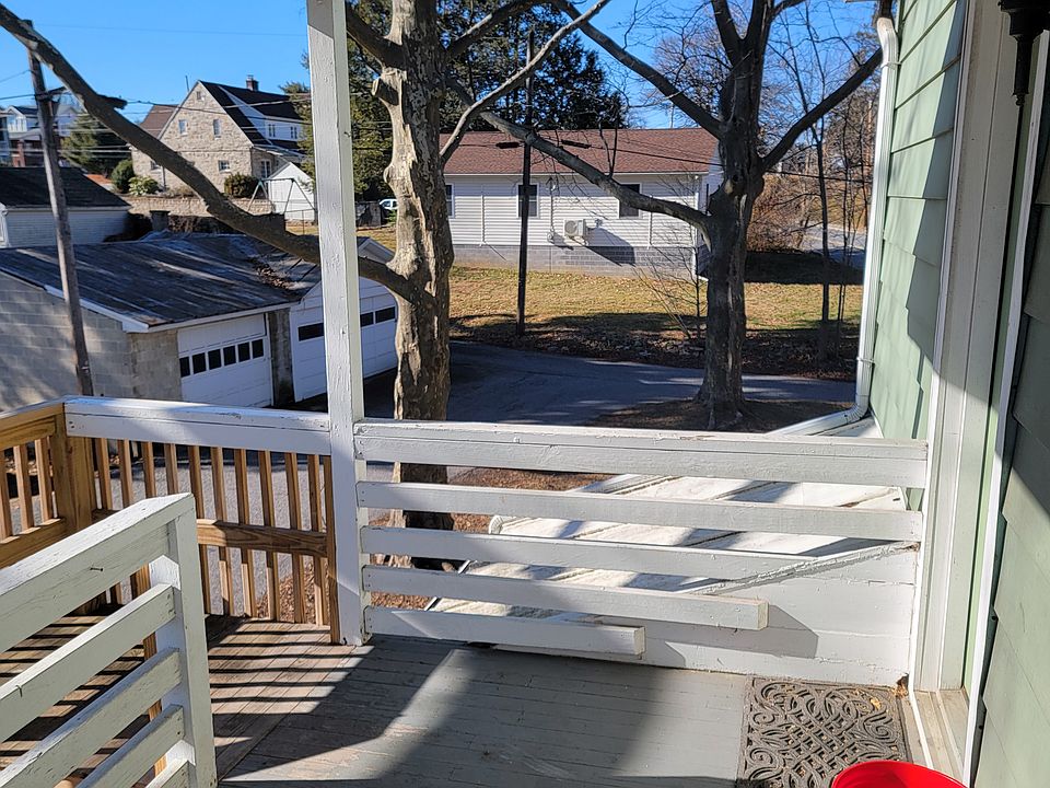 Back porch for coffee or a little grilling! 
Brand new back stairs!