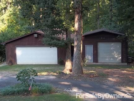 Garages : 2 car garage and a 1 car garage/storage building.