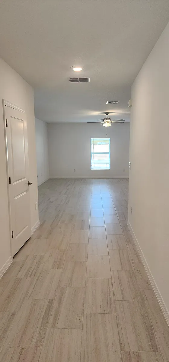 Photo 2 of 30 - 2529 Leonia Ln - Zephyrhills, FL Foyer - 2529 Leonia Ln