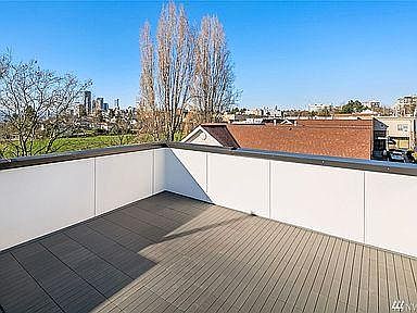 Roof top with view of Seattle