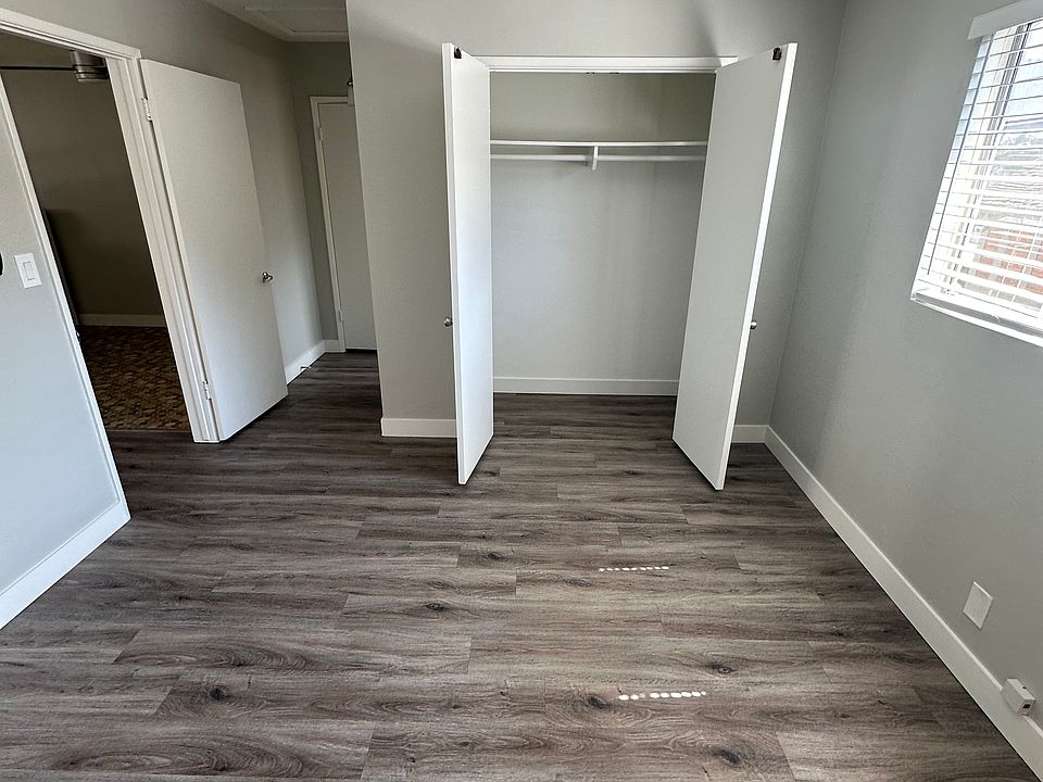 Bedroom Shown with Double Closet Doors Open