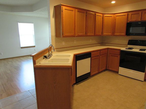 Large kitchen with oodles of cabinets!