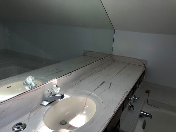 Upstairs bathroom. Overhead is a skylight.