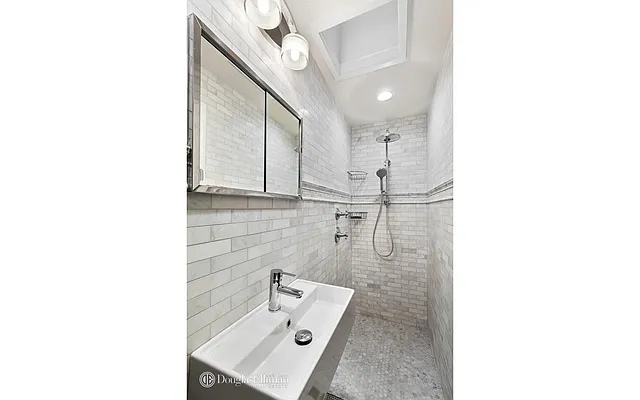 Sold by Douglas Elliman | media 9