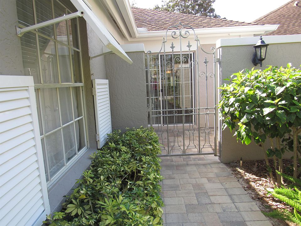 The walkway to your spacious condo in The Meadows.