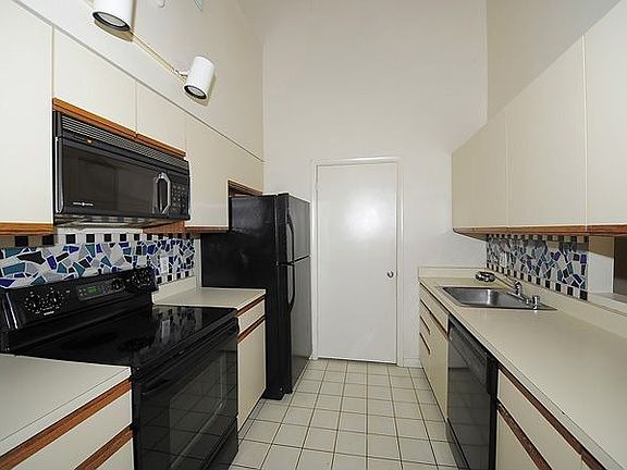 Kitchen with Upgraded Appliances and Back Splash
