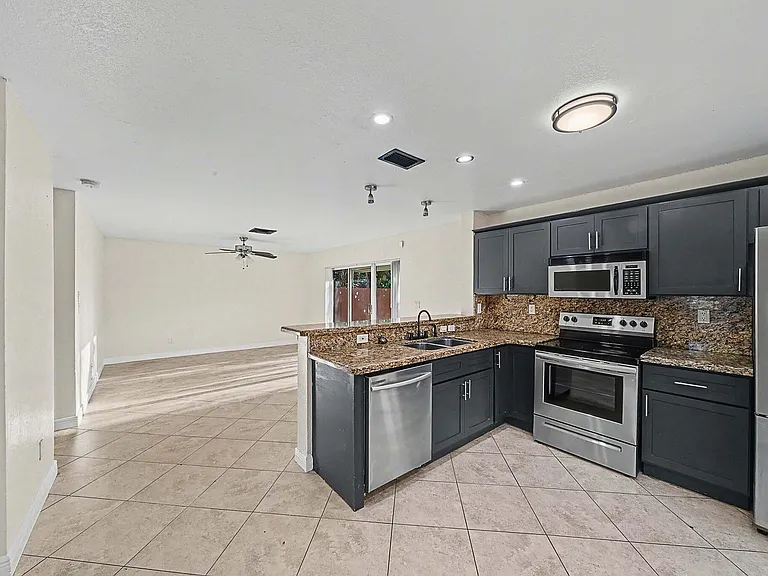 5789 Woodland Point Dr — Photo 29