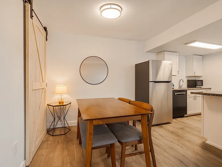 Seamlessly connected to the kitchen and the living room, this dining space makes meals effortless _ whether you're cooking in or enjoying takeout after a day of adventure.