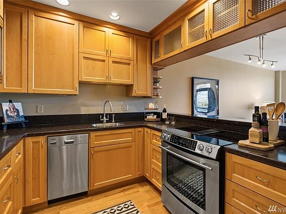 Custom Cabinet and lots of nice countertop. Love the pass through open feel.