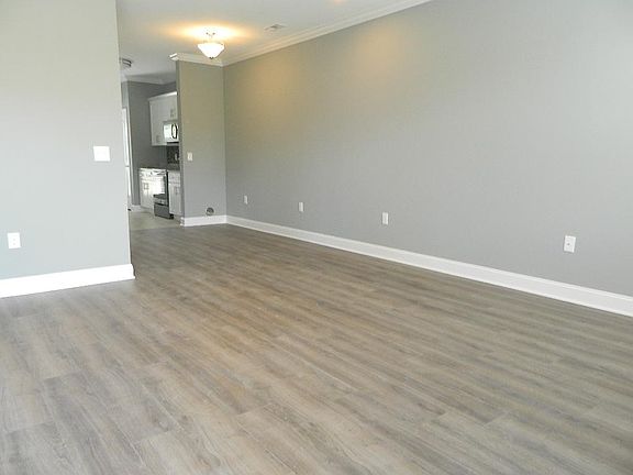 Looking from living area thru dining area to kitchen