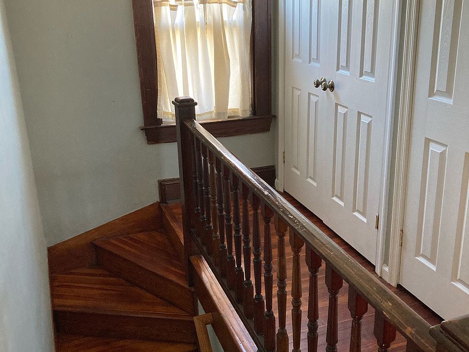 hallway with closets