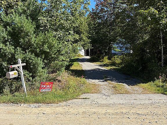 View up driveway to house