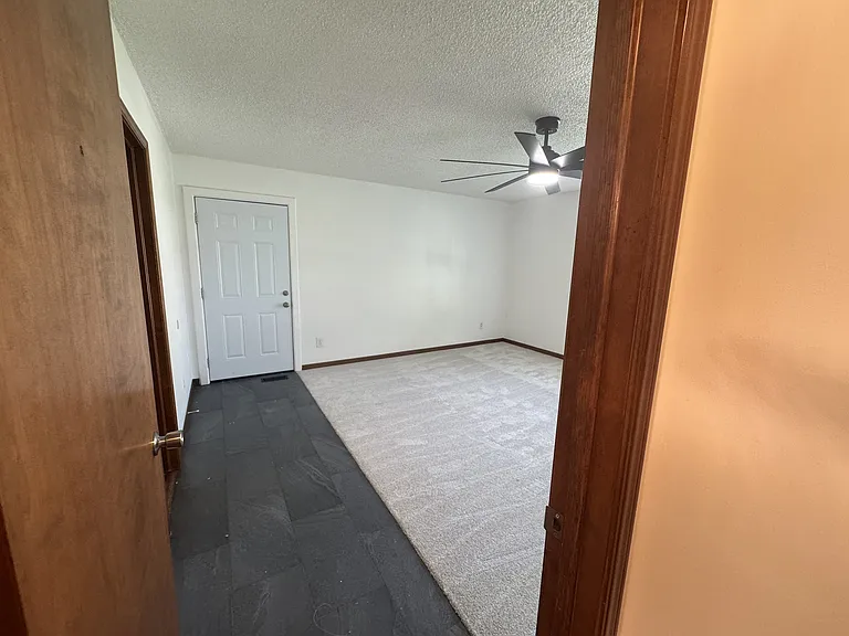 Master bedroom view. door to garage on far left