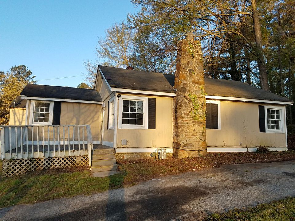 You can fit a couple of rocking chairs on this porch!