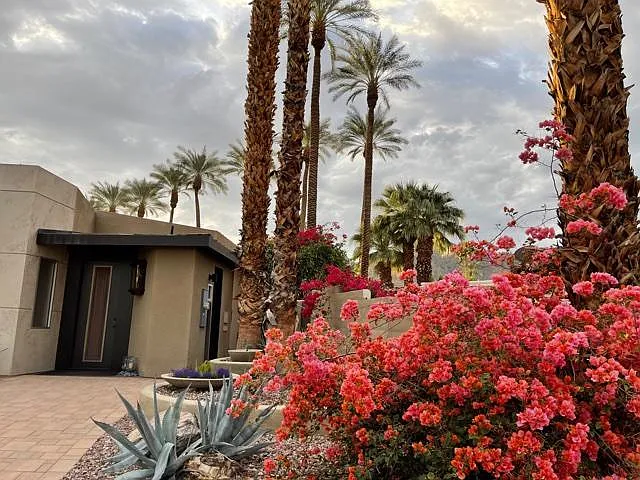 Welcome Guest home Colorful entry plantings