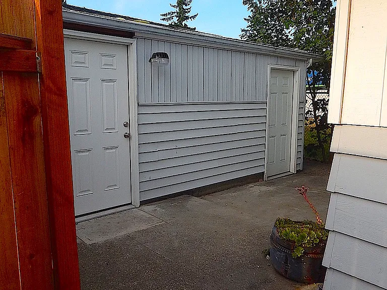 Laundry room is to the left and storage room to the right.
