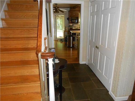 Center hall entrance with slate floor