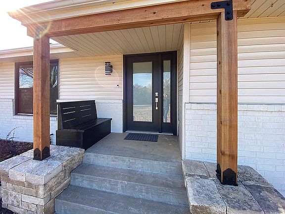 Custom stone and cedar entry