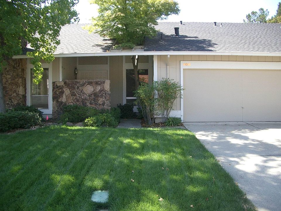 Beauty curb appeal with lush landscaping  on a cul de sac