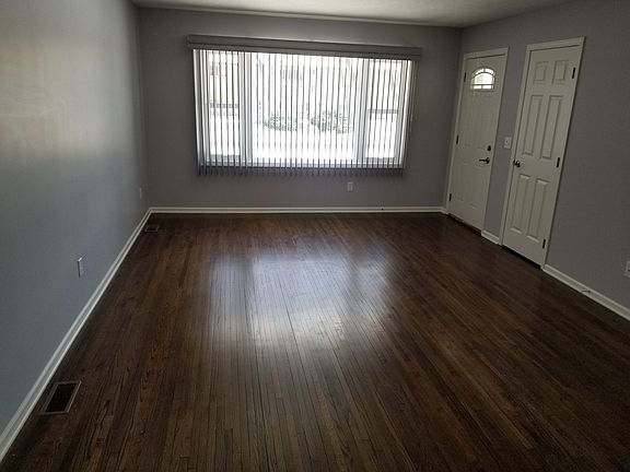 Huge living room with hardwood floors