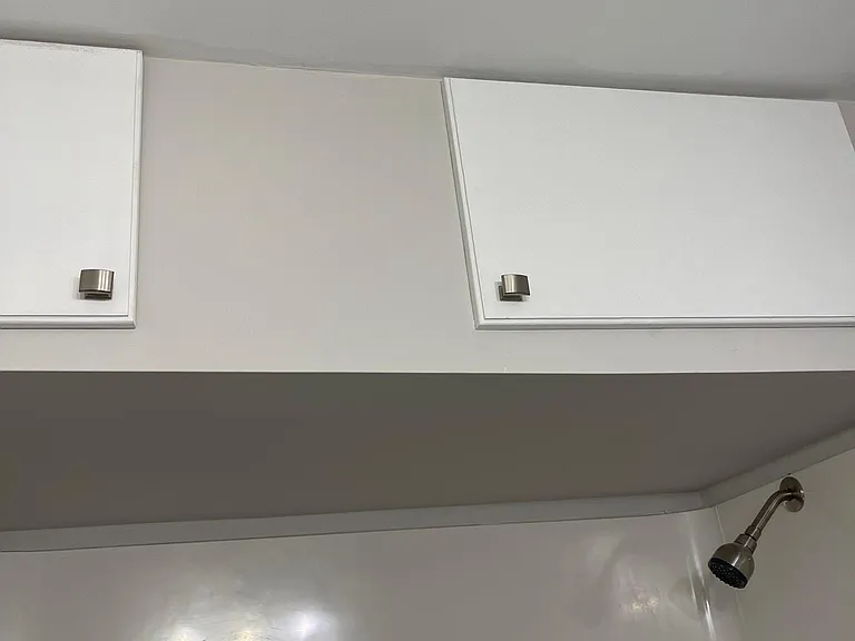 Storage above shower/tub