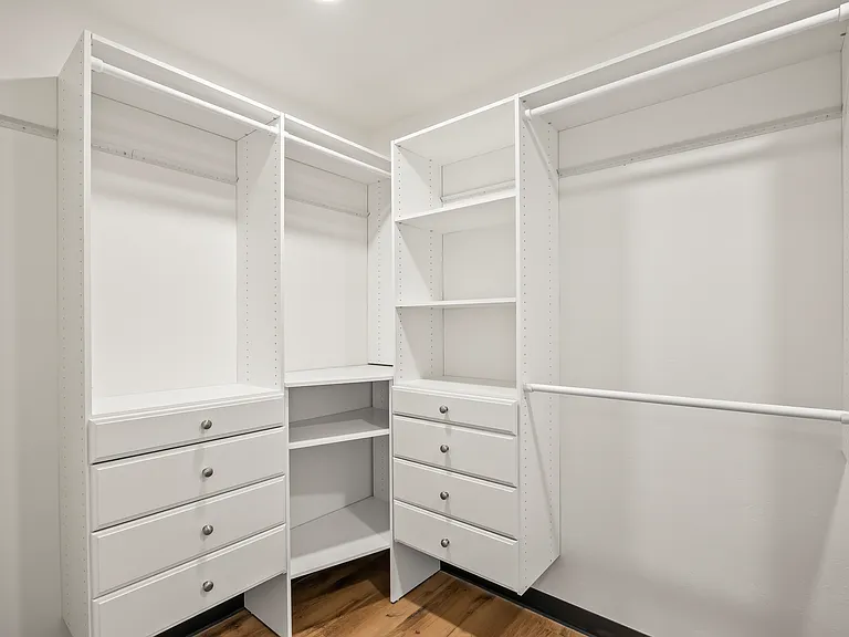Walk in master closet with front load W/D and shelving (to be added)