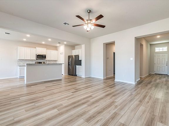 FAMILY ROOM, KITCHEN & FRONT FOYER 
 JUST STUNNING AND EVEN BETTER IN PERSON
