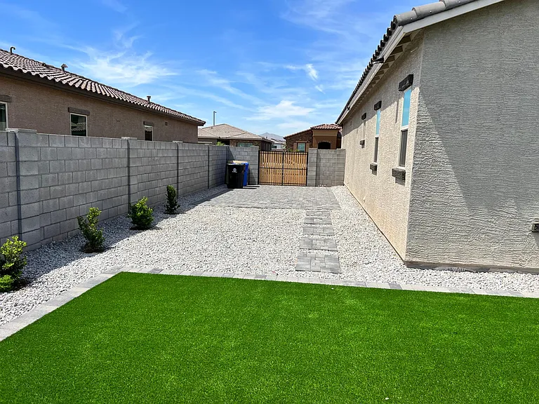 Extra paved parking inside 8' gate