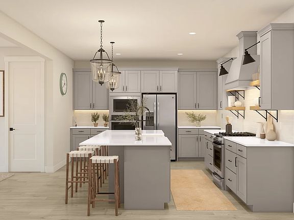 Kitchen with quartz island and countertops