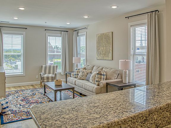 Wide open living room to the kitchen

*unit listed in UNFURNISHED
Photos are for reference only.