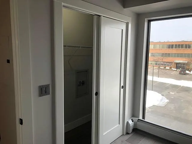 Master bedroom closet with wall safe