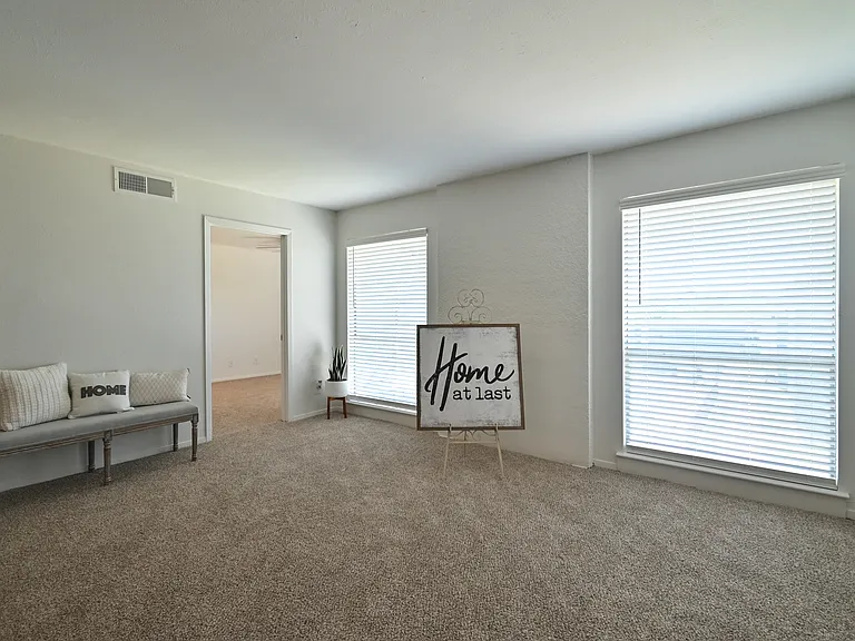 Open floor plan with view of living and dining areas