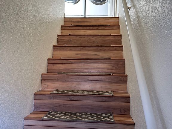 Stairs to upstairs, 3rd level. Washer and dryer included.