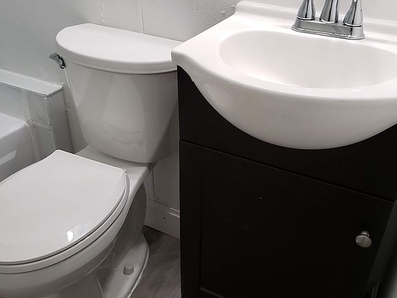 Updated bathroom facilities,complete with tub and shower combo.