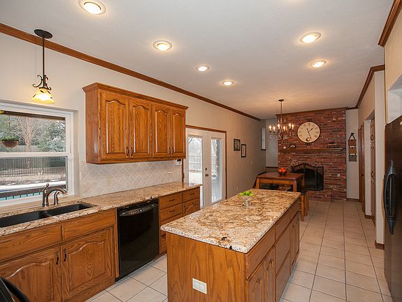 Updated kitchen, Granite, Wood burning fireplace, Pantry, Tile floor