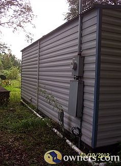Side of house with electrical box
